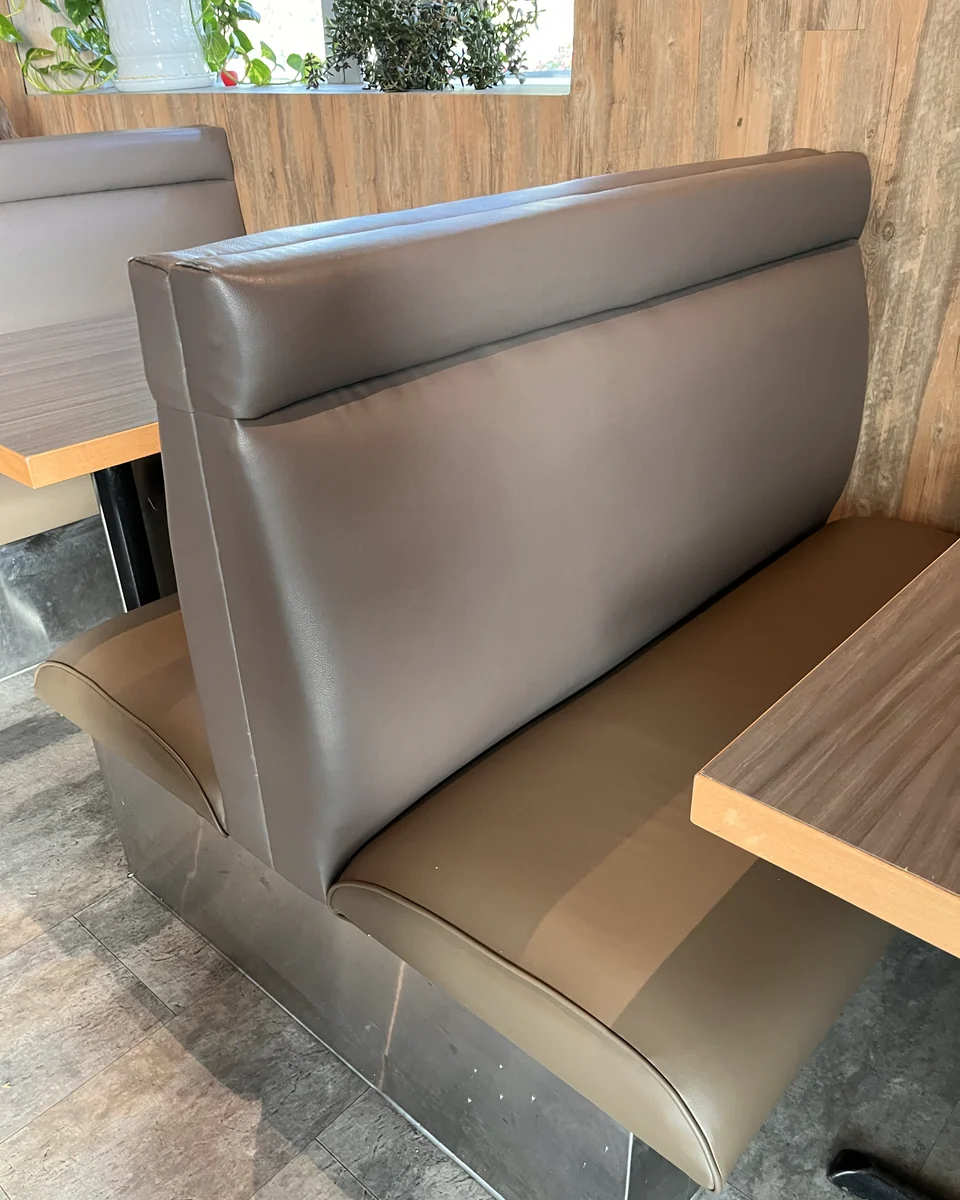 Restored restaurant booths and dining seating