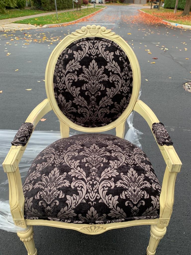 Traditional residential armchair after patterned reupholstery